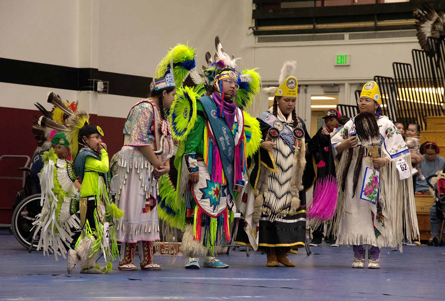 Participants in traditional regalia at Grand Mesa Pow-Wow