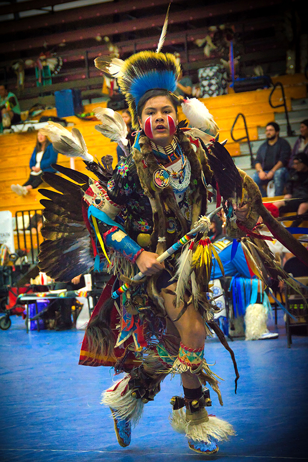 Indigenous dancer in traditional regalia