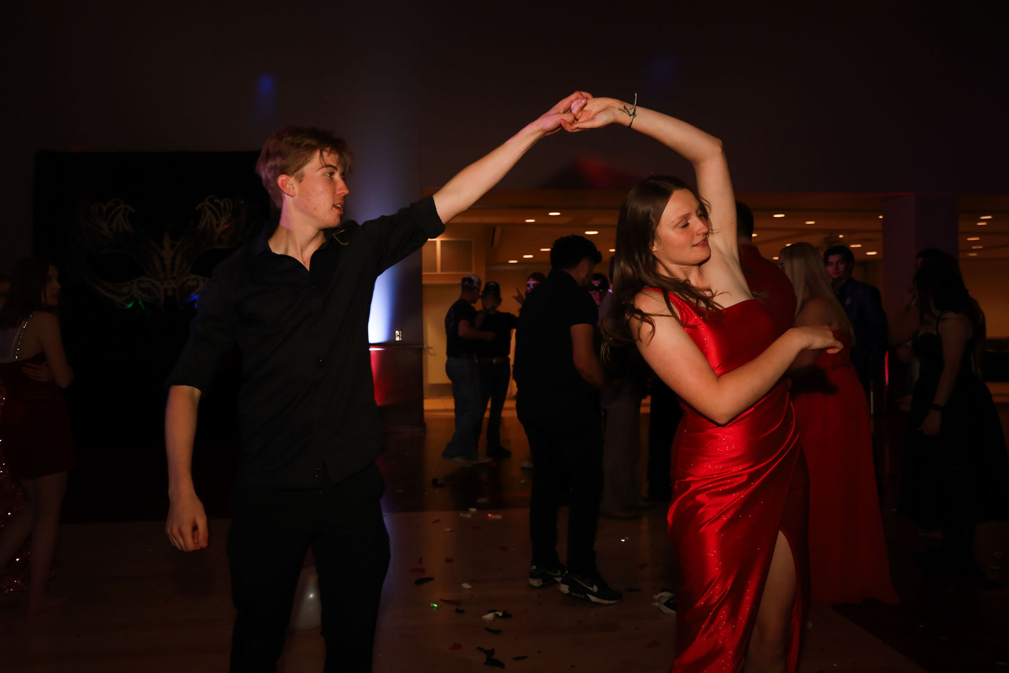 Couple dancing at Masquerade Prom