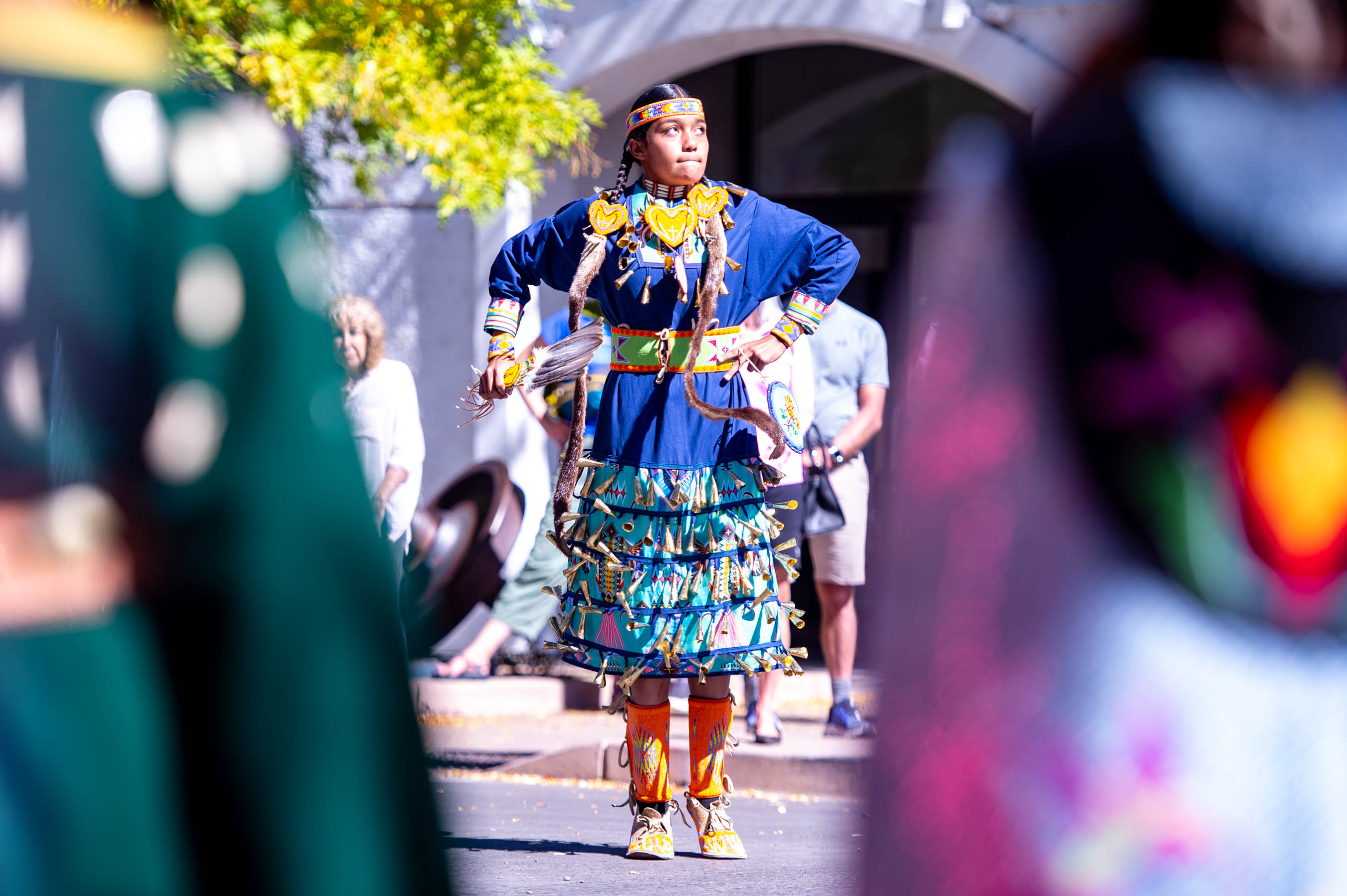 Native American dancer in traditional jingle dress