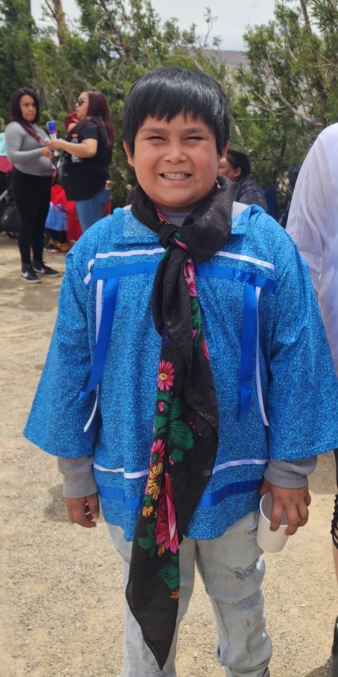 Young participant in a cultural gathering