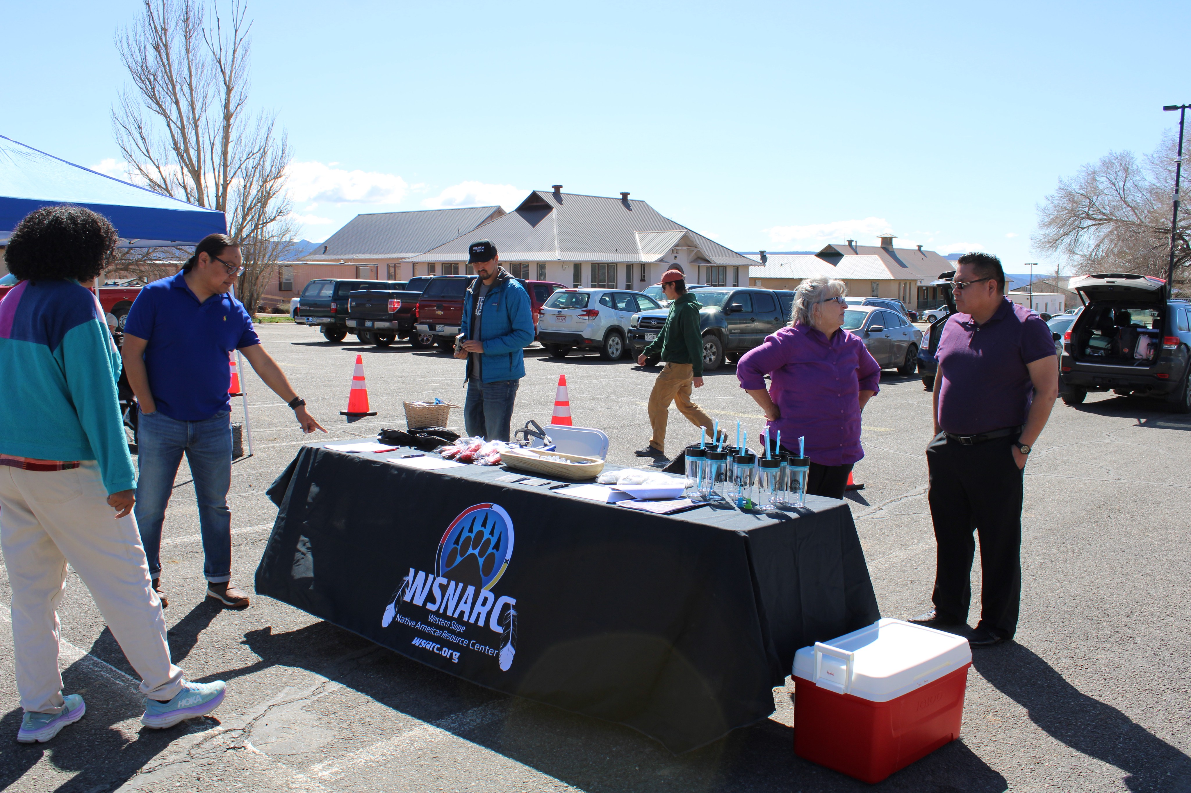People gathered around WSNARC information table